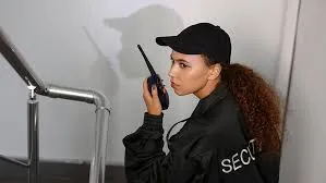 Security officer communicating by radio
